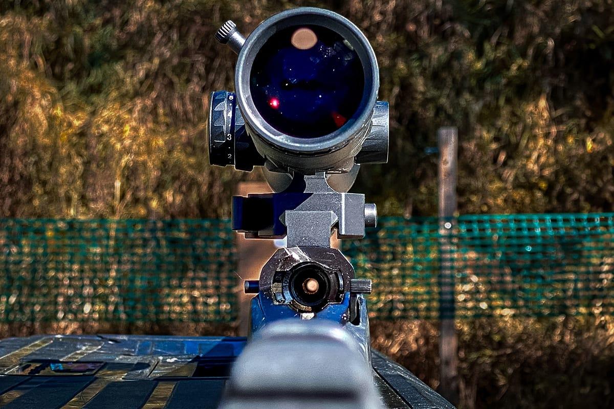 looking down the bore of a rifle while boresighting