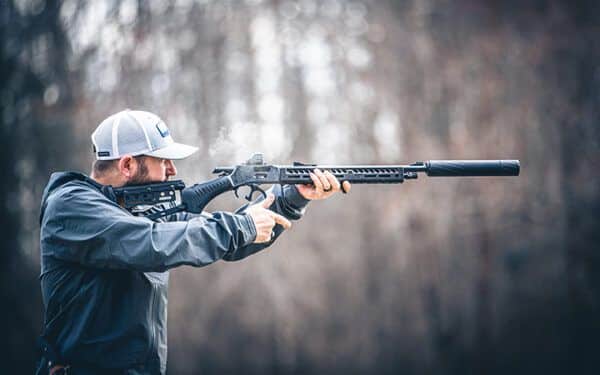 shooting a suppressed lever action rifle with a silencer central suppressor