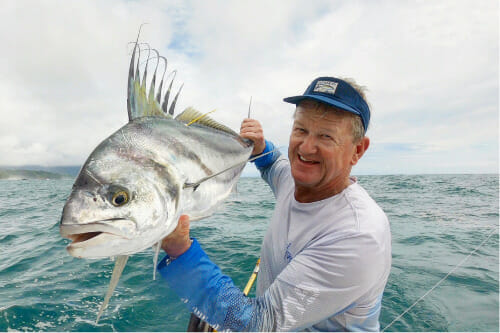 Guy Harvey holding a fish