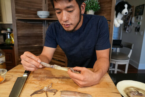 Shota Nakajima holding a squid